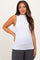 woman wearing a white sleeveless maternity top with a mock neck and fitted style, showcasing her baby bump