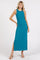 woman wearing a teal sleeveless maxi dress with a side slit and a fitted silhouette