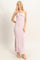 woman wearing a pink and white striped halter neck maxi dress with side slits