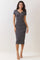 woman wearing a fitted navy and white striped midi dress with short sleeves and a V-neckline