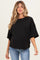 woman wearing a black oversized maternity sweatshirt with short sleeves and a relaxed fit, showing her baby bump
