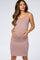 woman wearing a light mauve tank dress, showcasing her baby bump, designed for maternity wear