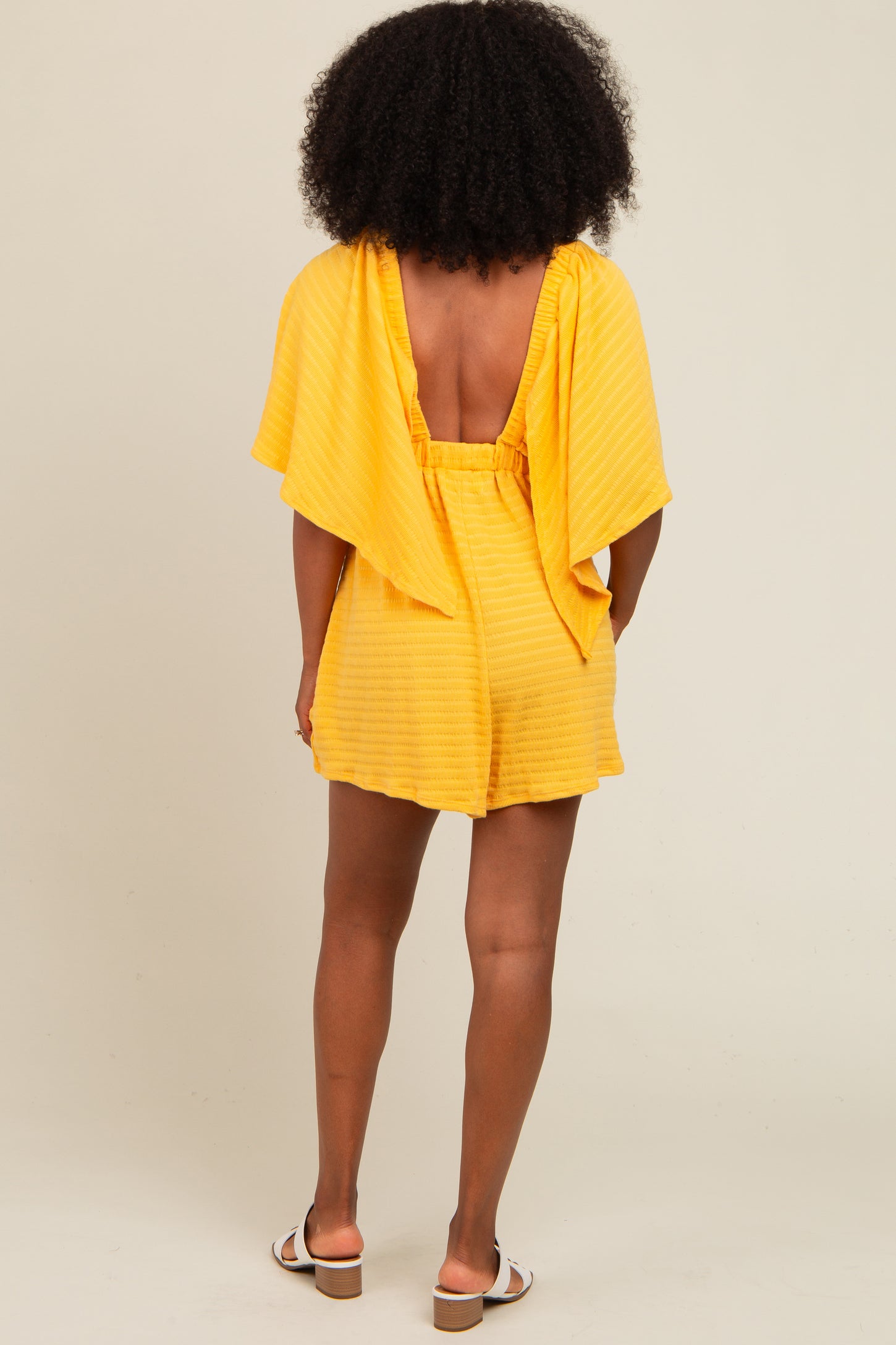 Yellow Textured Open Back Romper