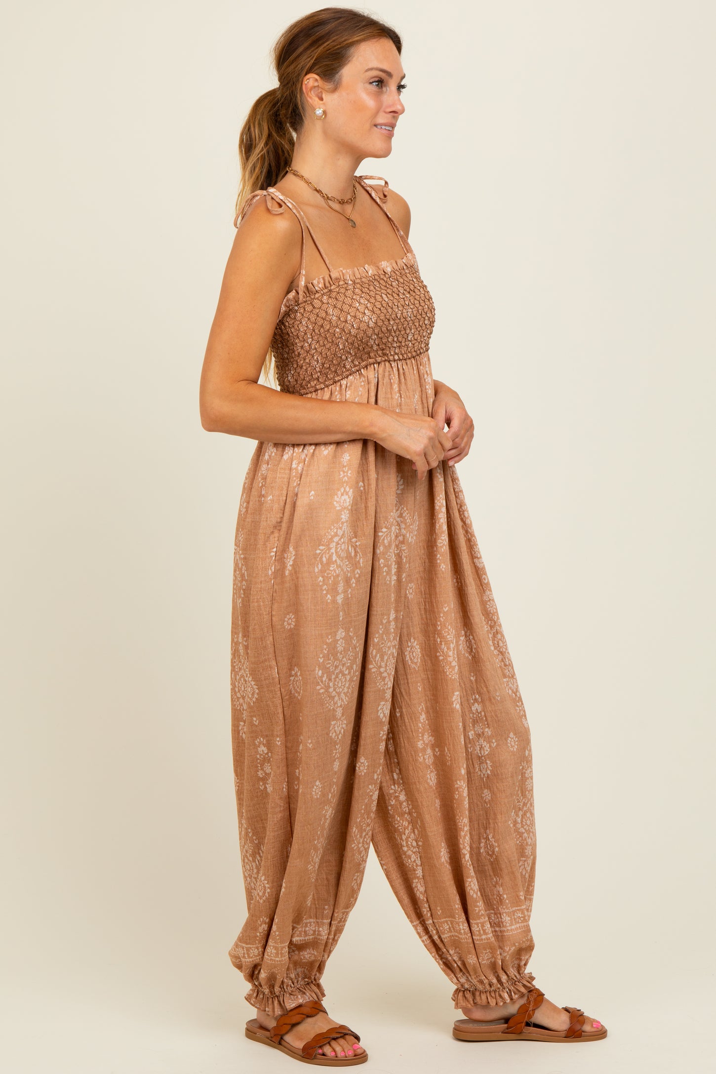 Camel Printed Smocked Shoulder Tie Jumpsuit