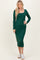 woman wearing a dark green long sleeve midi dress with a square neckline and white sneakers