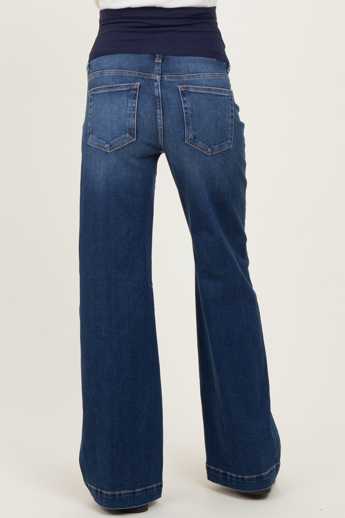 woman wearing dark blue maternity wide-leg jeans with a stretchy waistband, viewed from the back