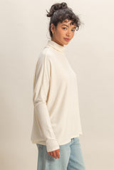 Cream Draped Oversized Turtleneck Dolman Sleeve Top