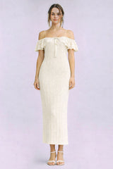 woman wearing a cream off-the-shoulder ribbed midi dress with ruffled sleeves and a tie detail