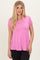 woman wearing a vibrant pink short sleeve top with a v-neckline and relaxed fit