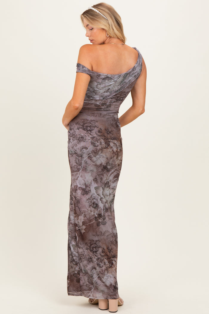 woman wearing a floral off-the-shoulder maternity gown with a fitted silhouette and flowing skirt, showing her back