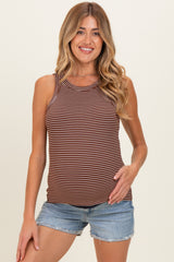 woman wearing a striped brown and cream maternity tank top with a baby bump, paired with denim shorts