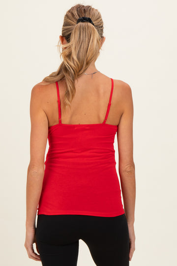 woman wearing a red maternity tank top with adjustable straps, viewed from the back