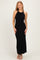 woman wearing a black ribbed maxi dress with a halter neck and a fitted silhouette