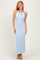 woman wearing a light blue ribbed maxi dress with a halter neck and a fitted silhouette