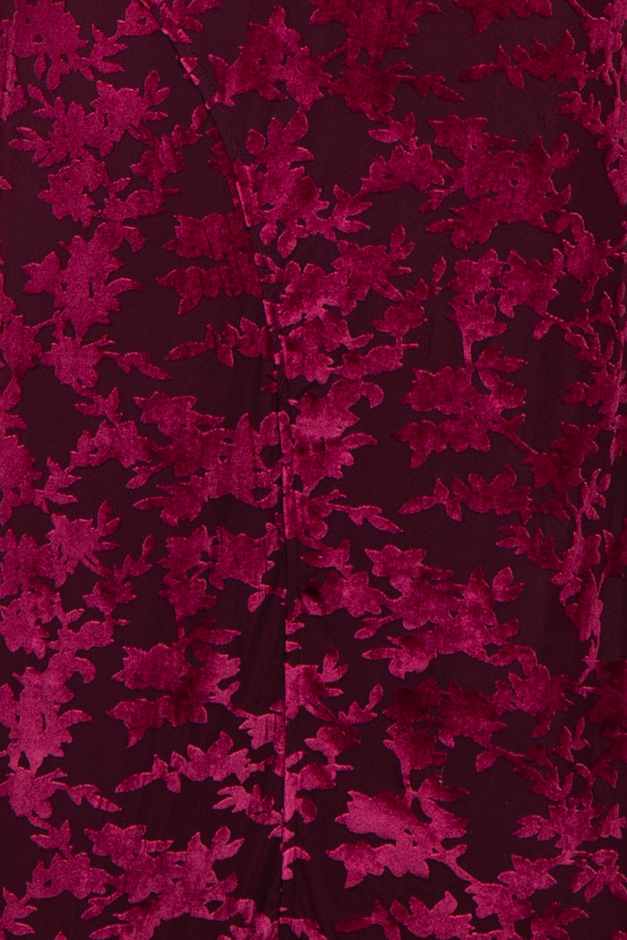 burgundy velvet dress with floral pattern and smooth fabric texture