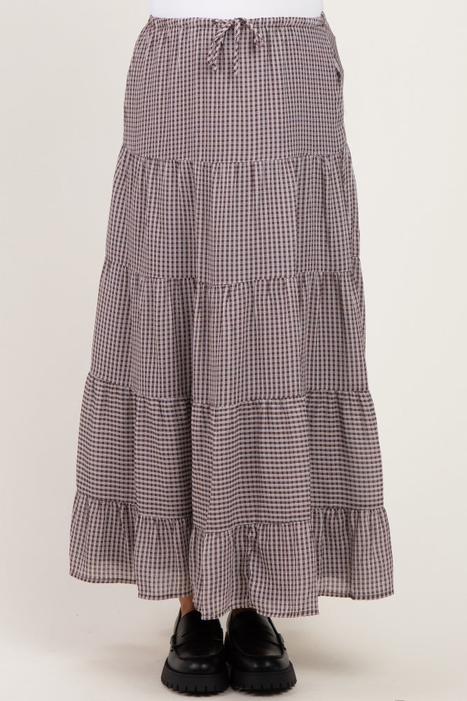 maternity wear tiered maxi skirt in brown and cream gingham pattern with a drawstring waist, styled with black shoes