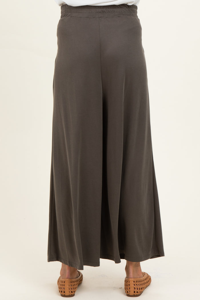 maternity wear long dark gray wide-leg pants showing the back view with an elastic waistband