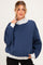 woman wearing a navy blue maternity sweatshirt with a gray funnel neck and relaxed fit