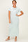 woman wearing a light mint green short sleeve maxi dress with a relaxed fit and round neckline