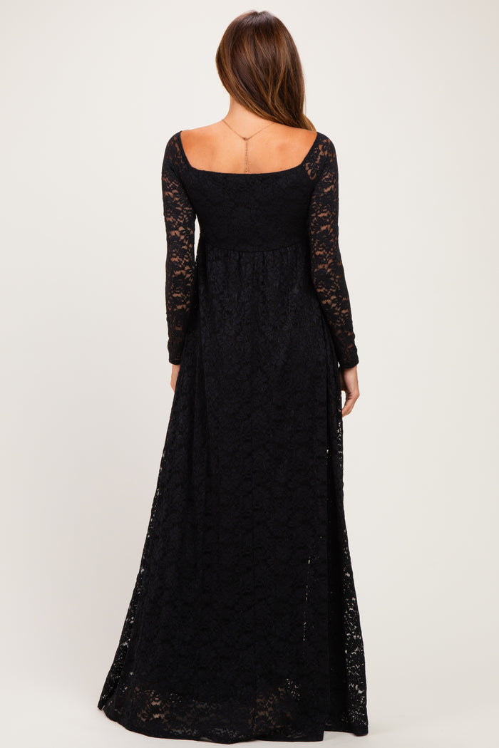 woman wearing a black long sleeve lace maxi dress, showing the back view and a flowy silhouette