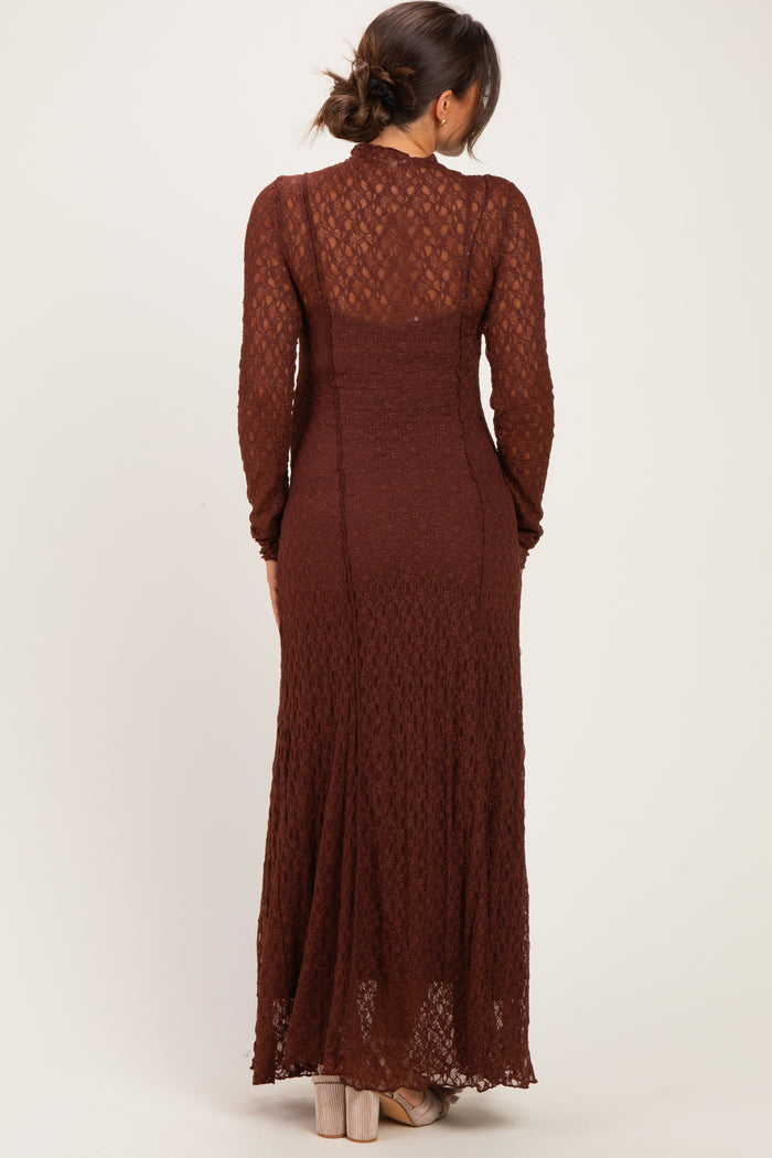 woman wearing a brown long sleeve lace maternity dress seen from the back