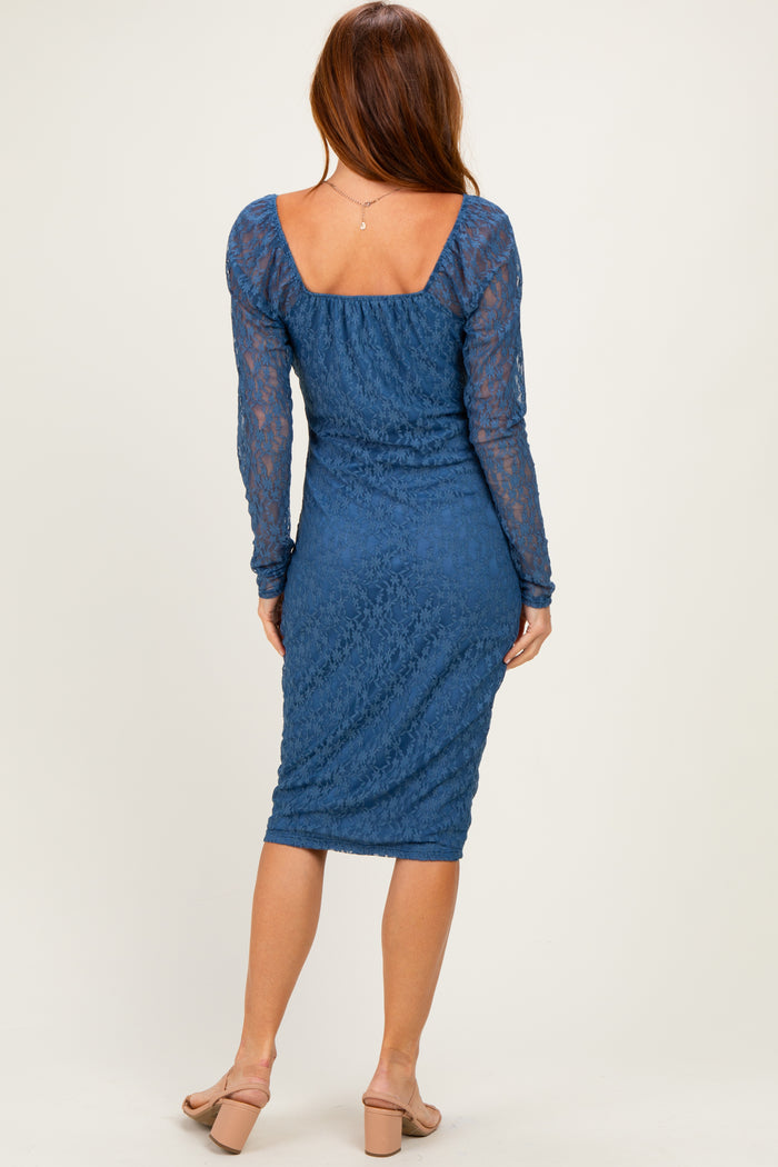 woman wearing a blue lace long sleeve dress with a fitted silhouette and square back neckline