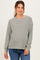 woman wearing a striped maternity long sleeve top with relaxed fit and cozy style, highlighting her baby bump