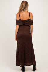 woman wearing a brown off-the-shoulder lace maternity maxi dress, showing a ruched back detail
