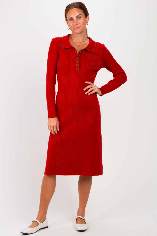 woman wearing a red ribbed midi dress with a collar and buttons, styled with white flats