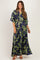 woman wearing a navy blue floral maternity maxi dress with a cinched waist and flutter sleeves, showcasing her baby bump
