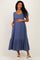 woman wearing a blue striped maternity dress with short sleeves and a tiered skirt, holding her baby bump