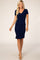 woman wearing a navy blue short sleeve bodycon dress with a v-neckline