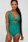 woman wearing a teal one-piece swimsuit with a twist front and cut-out details