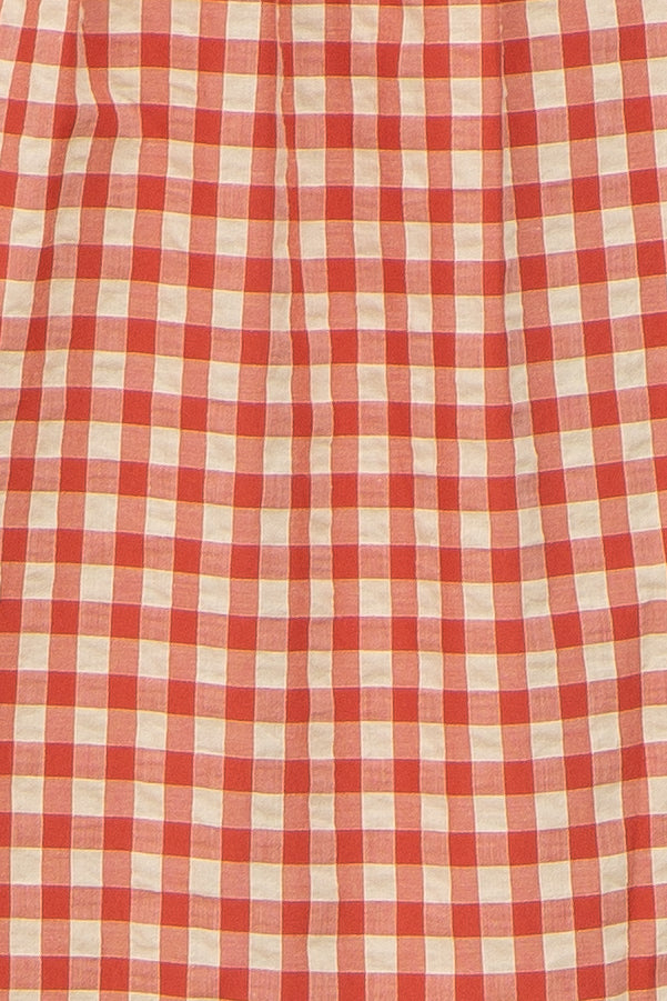 red and beige gingham patterned fabric, suitable for a skirt or dress