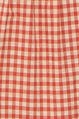 red and beige gingham patterned fabric, suitable for a skirt or dress