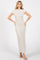 woman wearing a beige short sleeve maxi dress with a fitted silhouette and side slits